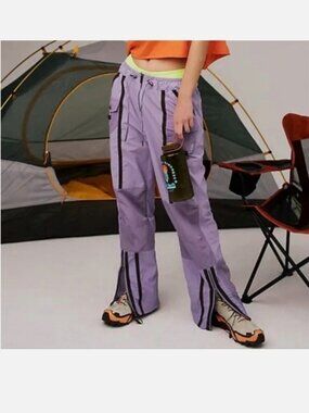 FP Movement by Free People Lilac Track pants with black stripes.